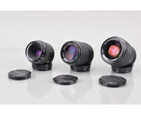 Three Pentax Lenses, all K mount, a SMC A Macro 50mm f/2.8 lens, SMC M 135mm f/3.5 lens and a SMC M Zoom 35-70mm f/2.8-3.5 le