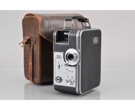 A Zeiss Ikon Movikon K 8mm Cine Camera, motor runs, body G, with double 8 cartridge, C Zeiss Jena 1cm f/2 Sonnar lens, elemen