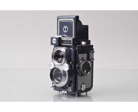 A Yashica LM TLR Camera, shutter working, self timer working, light cell unresponsive, body G, with Yashinon 60mm f/3.5 lens,
