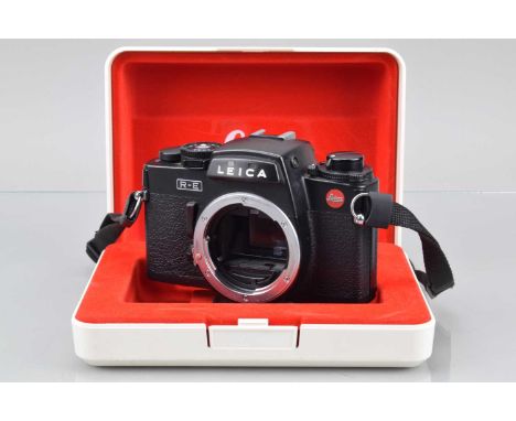 A Leica R-E SLR Camera Body, black, made in Germany, serial no 1753966, 1988, shutter working, meter responsive, responsive i
