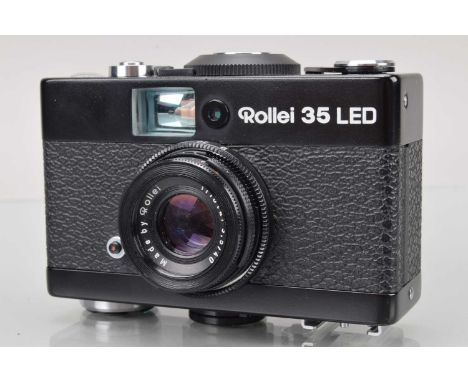 A Rollei 35 LED Compact Camera, shutter working, meter responsive, body VG, with 40mm f/3.5 Triotar lens, elements VG, in Rol