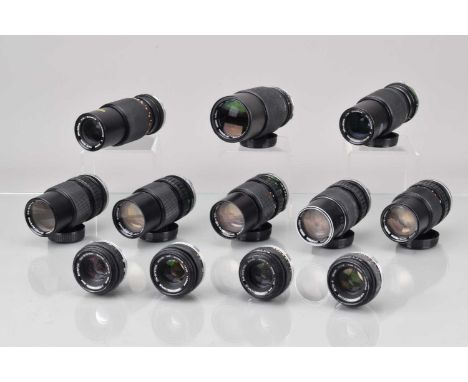 A Group of Olympus OM Lenses, four Zuiko 50mm f/1.8 lenses, one with ding to filter ring, elements F, fungus, five Zuiko 75-1