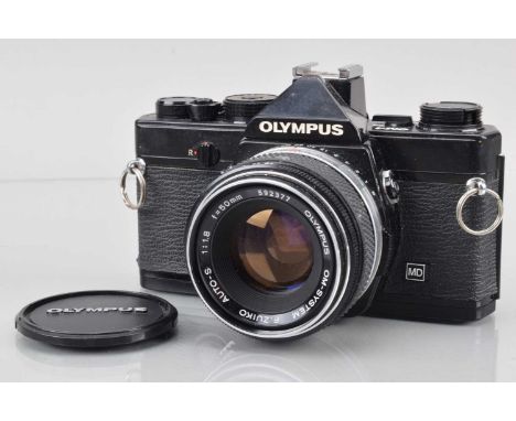 An Olympus OM-1 MD SLR Camera, black, shutter working, meter responsive, self timer working, body G, with F Zuiko 50mm f/1.8 