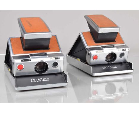 Two Polaroid SX-70 Land Cameras, bodies G, one with film door not snapping shut, other not  snapping flat, untested, elements
