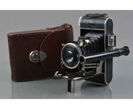 A Kochmann Enolde 6x9cm Folding Camera,  body G, original owners details etched inside film door, EJL etched to both lens doo