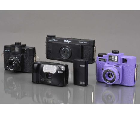 Novelty and Compact Cameras, a Holga 120WPC wide pinhole camera, two Holga 120CFN, one black, one purple, a Ricoh FF-9s Date 