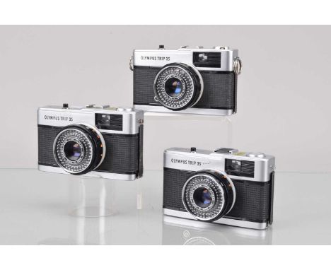 Three Olympus Trip 35 Compact Cameras, one with working shutter, responsive light cell/aperture, G, one with working shutter/