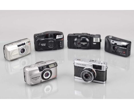 A Group of Olympus Compact Cameras, an Olympus Trip 35, chrome button, shutter working, responsive in auto, G, XA-1, shutter 