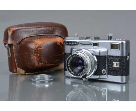 A Voigtländer Vitessa T Rangefinder Camera, shutter sluggish in slow speeds, light cell responsive, rangefinder working, self