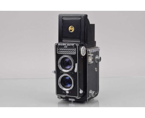 A Ricoh 66 Auto TLR Camera, shutter working, light cell responsive, self timer working, body G, with 8cm f/3.5 lens, elements