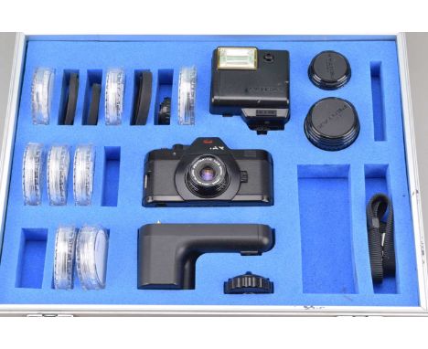 A Pentax Auto 110 Super Camera, shutter working, meter responsive, self timer working, body G, wear to lettering, with 24mm f