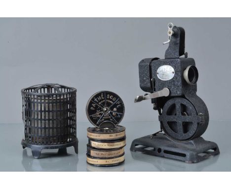 A Pathe Kid 9.5mm Cine Projector, hand crank moves freely, body G, elements G, with 9.5mm Pathe films, titles No 1 & 2 Felix 