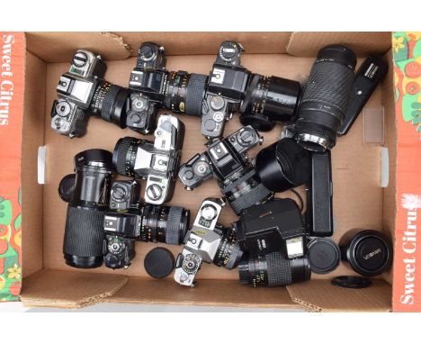 A Tray of Minolta SLR Cameras, a Minolta X-300, with MC Rokkor 50mm f/1.4 lens, X-500, with MD 28mm f/2.8 lens, X-700, with 3