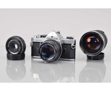 A Pentax ME SLR Camera, shutter working, meter responsive, self timer working, body G, with SMC 40mm f/2.8, SMC 50mm f/1.4 an