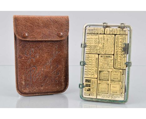 A James A Sinclair & Co Posograph Exposure Calculator, all moves freely, with manual, in leather case