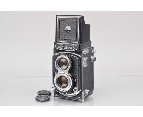 A Minolta Autocord TLR Camera,  shutter working, self timer working, body G, with Rokkor 75mm f/3.5 lens, elements F, fungus,