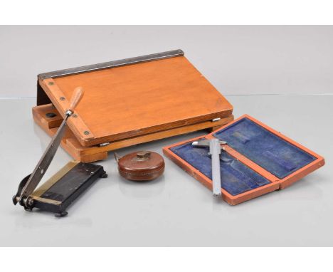 A Merretts Patent Guillotine light signs of use, with a German made smaller guillotine, G, Brown & Sharpe measuring gauge, in