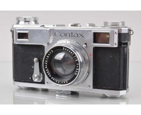 A Contax II Rangefinder Camera, shutter/winder jammed, self timer not working, rangefinder functions, body G, with Carl Zeiss