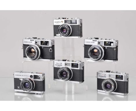 Six Olympus 35mm Cameras, two Olympus 35 SP, shutters working, meters responsive, otherwise untested, two 35 RC, shutters wor