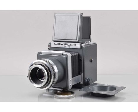 A Plaubel Makiflex Standard 9x9 Camera, shutter working, although clunky, body G-VG, no focus screen/film back, with Schneide