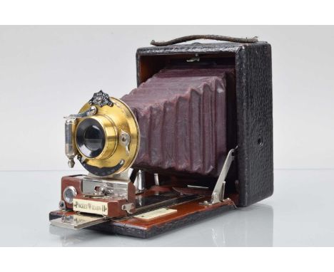 A Gundlach Manhattan Optical Co Pocket Wizard II Folding Bed Camera, shutter working, body G, some light scuffs & wear, bello