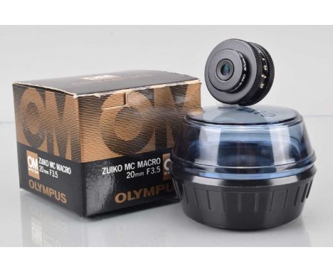 An Olympus Zuiko MC Macro 20mm f/3.5 Lens, barrel VG, elements VG, in bubble, with manual, in makers box