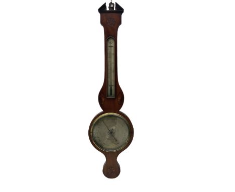  An early 19th century William IV mercury wheel barometer with a rosette inlaid broken pediment and correspondingly inlaid ro