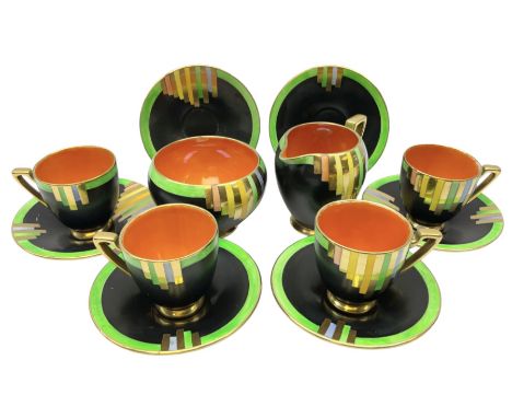 1930s Art Deco Carlton Ware Ziggarette pattern part coffee set, decorated with graduating geometric banding in gilt, blue, ye