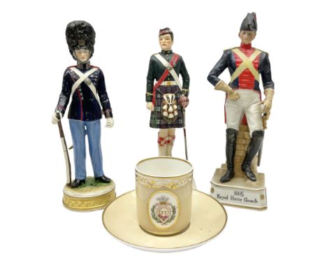 Three soldier figures comprising ?Rudolf K�mmer Volkstedt figure of Den Kgl. Danske Livgarde, Goebel Argyll &amp; Sutherland 