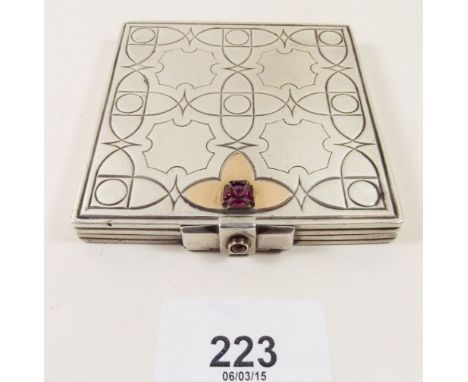 A continental white metal compact set red stones engraved geometric decoration