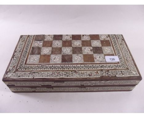 An Egyptian carved bone chess set with case - a/f