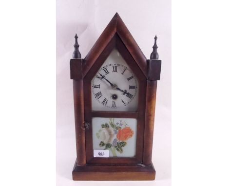An American arch top shelf clock by E N Welch