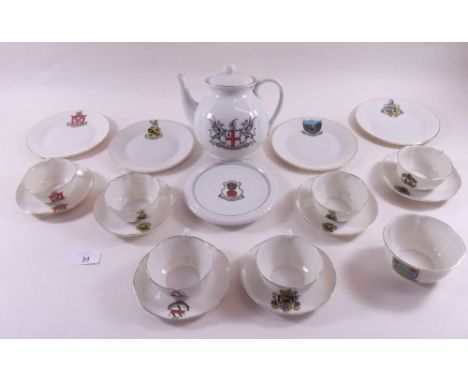 A Goss teaset comprising: teapot, six cups and saucers, sugar and four plates