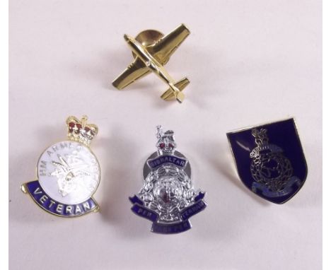 Four military enamel badges including Royal Marines