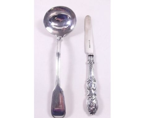 A Victorian silver ladle by Chainer & Co. - London 1858 and a silver butter knife - Sheffield 1878