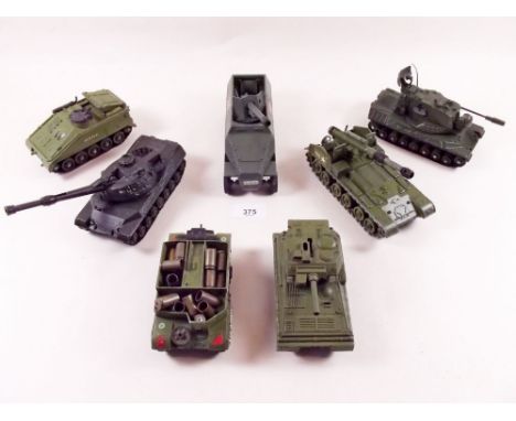 Seven Dinky army vehicles including tanks etc