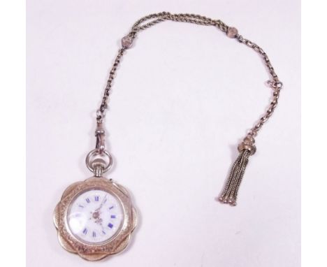 A 14 carat gold fob watch with enamel face on 9 carat gold fob chain