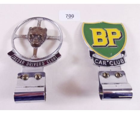 A Jaguars Drivers Club car badge and a BP Car Club badge