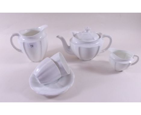 A Royal Crown Derby teaset, including 1 teapot, 1 milk jug, 1 cream jug, 1 sugar bowl, 6 tea plates, 6 cups and saucers and1 