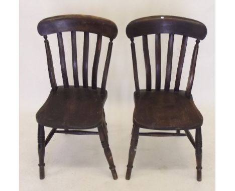 A pair of stick back kitchen chairs