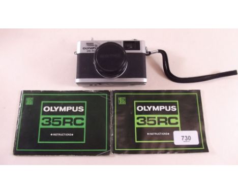 An Olympus 35rc camera with instructions