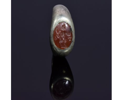 A carnelian intaglio ring with Faun / Satyr; Oval shaped, well preserved band. The faun (Latin: faunus, Ancient Greek: ??????