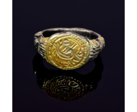 Superb Medieval silver ring with oval bezel carved with a beast motif; intact and well preserved band. Possibly a mythologica