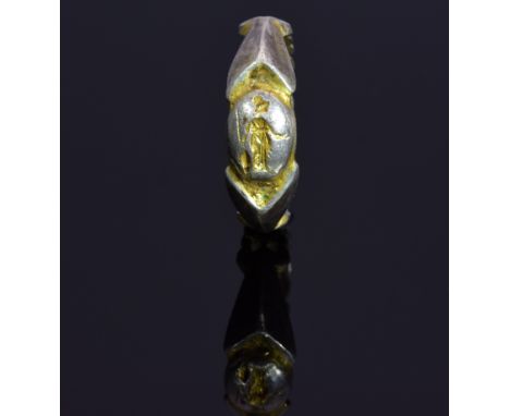 Rare Roman seal ring depicting goddess Roma standing on bezel; elaborate, open-work band with most of original gildingh still