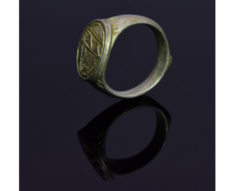 A Crusaders silver ring with a heraldic/family crest on bezel; intact oval shaped band. Possibly worn by a knight in the holy