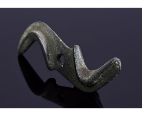 An important Viking Scadinavian mythological amulet shaped a stylized thunderbold associated with the "wrath of God Thor", pi