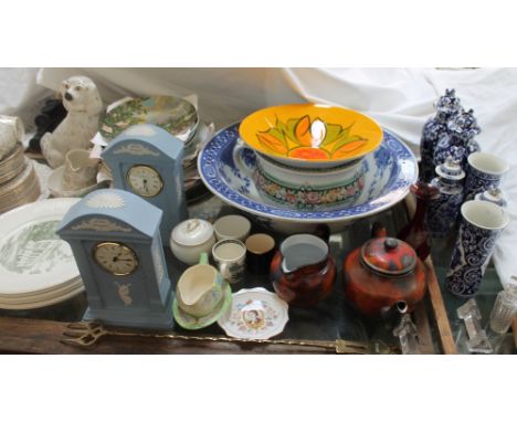 A Poole pottery dish together with Wedgwood clocks, Wood blue and white vases, blue and white pottery water basin, collectors