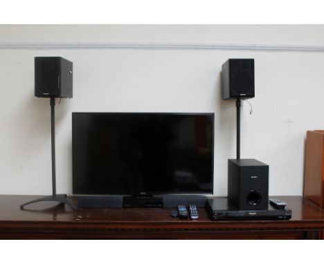 A Samsung model UE40JU6400K UHD flatscreen television, together with a Phillips Soundbar speaker HTL2160, subwoofer, Panasoni