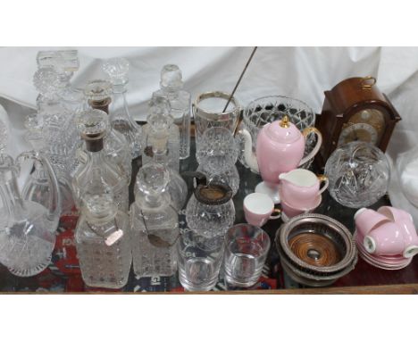 A pair of silver topped and glass decanters together with other glass decanters, glasses, bowls, Wedgwood part coffee set, el