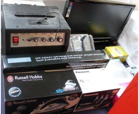 A collection of new and used boxed appliances  including a Sharp flat screen television together with an amplifier, wireless 